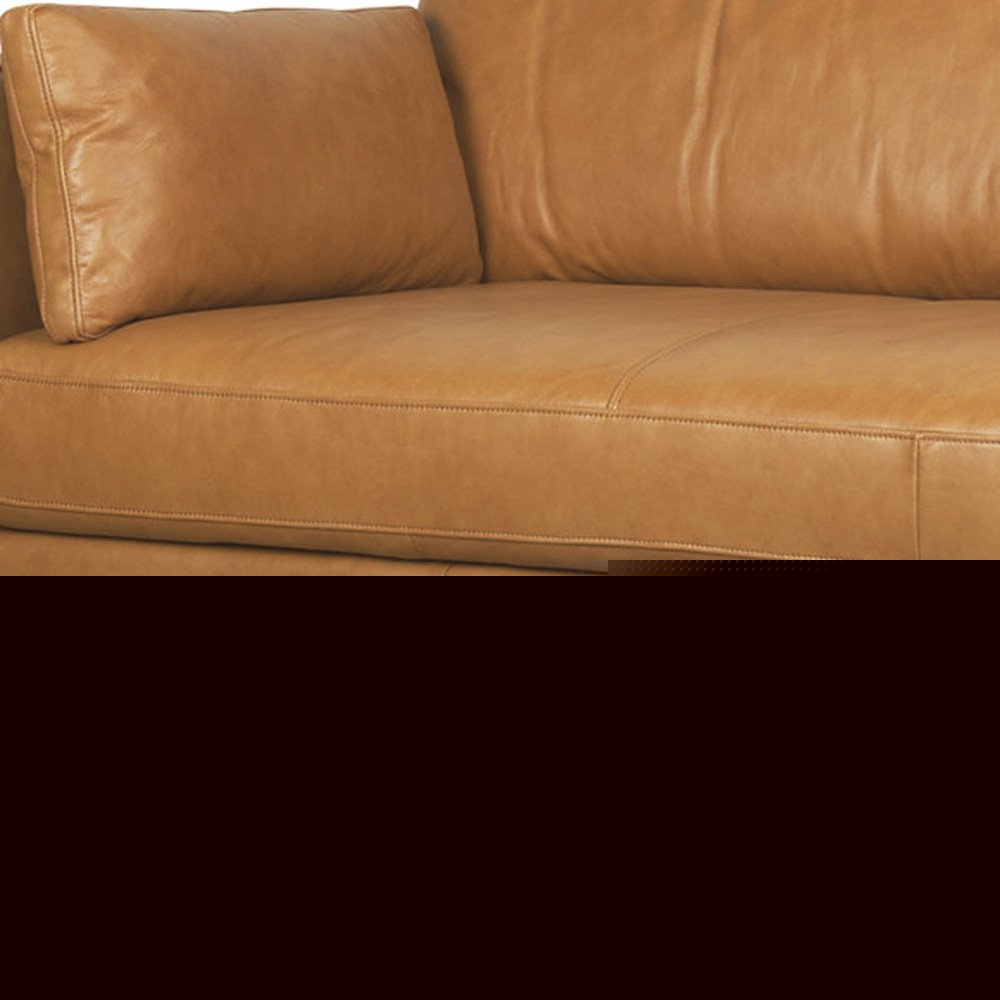 88" Tan Leather Sofa And Toss Pillows With Brown Legs