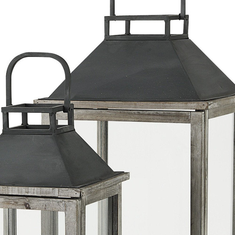 Set of Two Black Distressed Geometric Metal And Solid Wood Tabletop Lantern Candle Holders