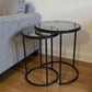 Set of Two Clear and Gunmetal Glass and Iron Round Frame Nested Tables