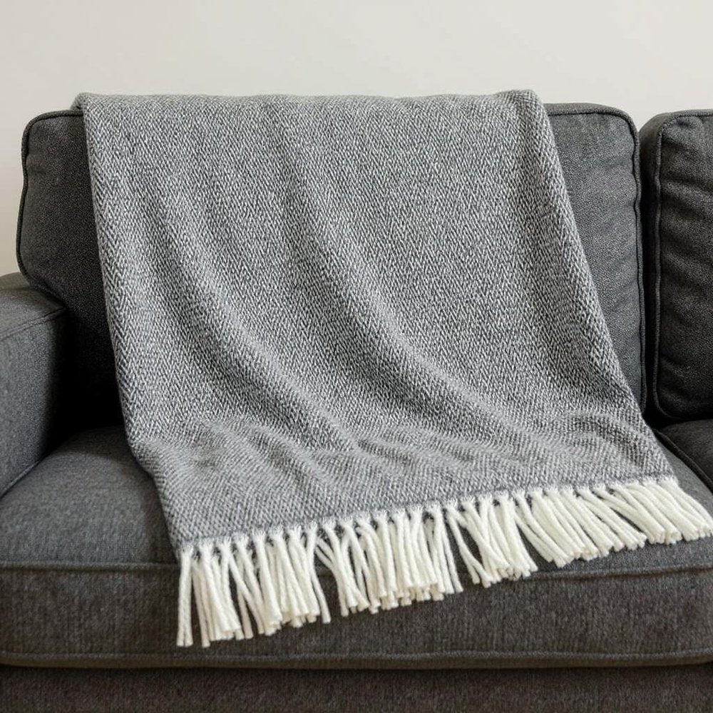 55" X 70" Dark Gray And White Cotton Blend Woven Herringbone Plush Throw Blanket with Fringe