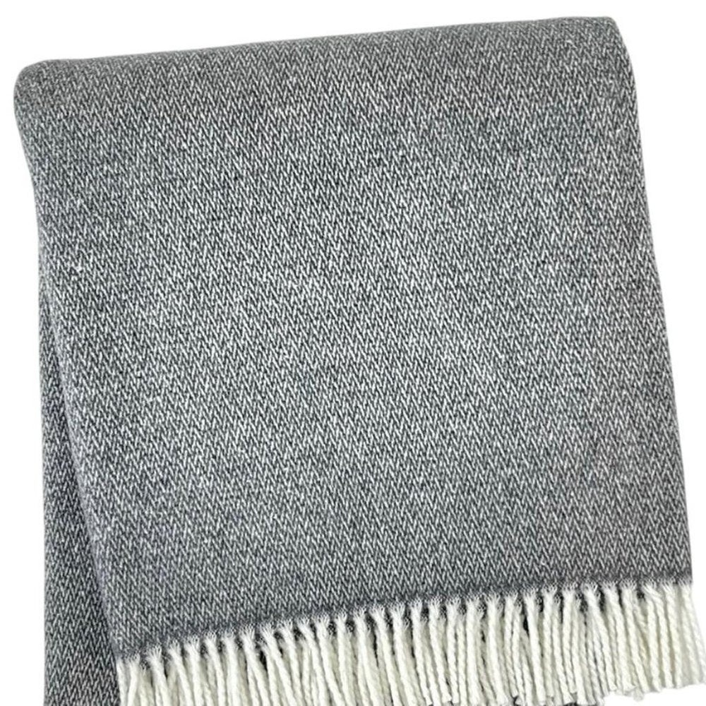 55" X 70" Dark Gray And White Cotton Blend Woven Herringbone Plush Throw Blanket with Fringe