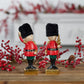 Set of Two Black Gold And Red Polyresin Christmas Nutcracker Figurines