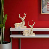 Set of Two Gold And White Polyresin Deer Christmas Figurine