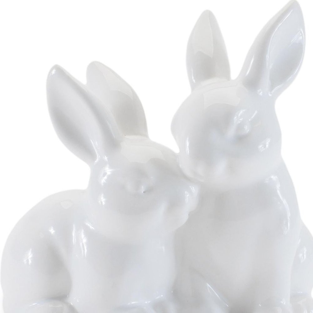 Set of Four White Ceramic Rabbit Figurine
