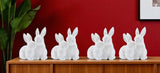 Set of Four White Ceramic Rabbit Figurine
