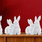 Set of Four White Ceramic Rabbit Figurine