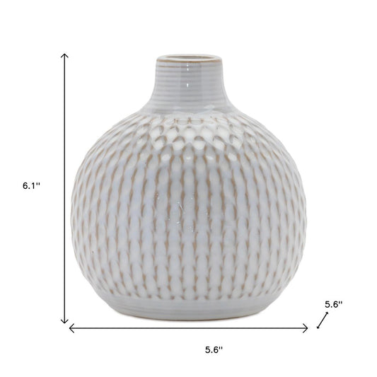 Set of Four Natural And Off White Ceramic Bud Vases With Sculptural Details