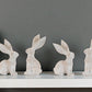 Set of Four Beige Resin Bunny Rabbit Figurines