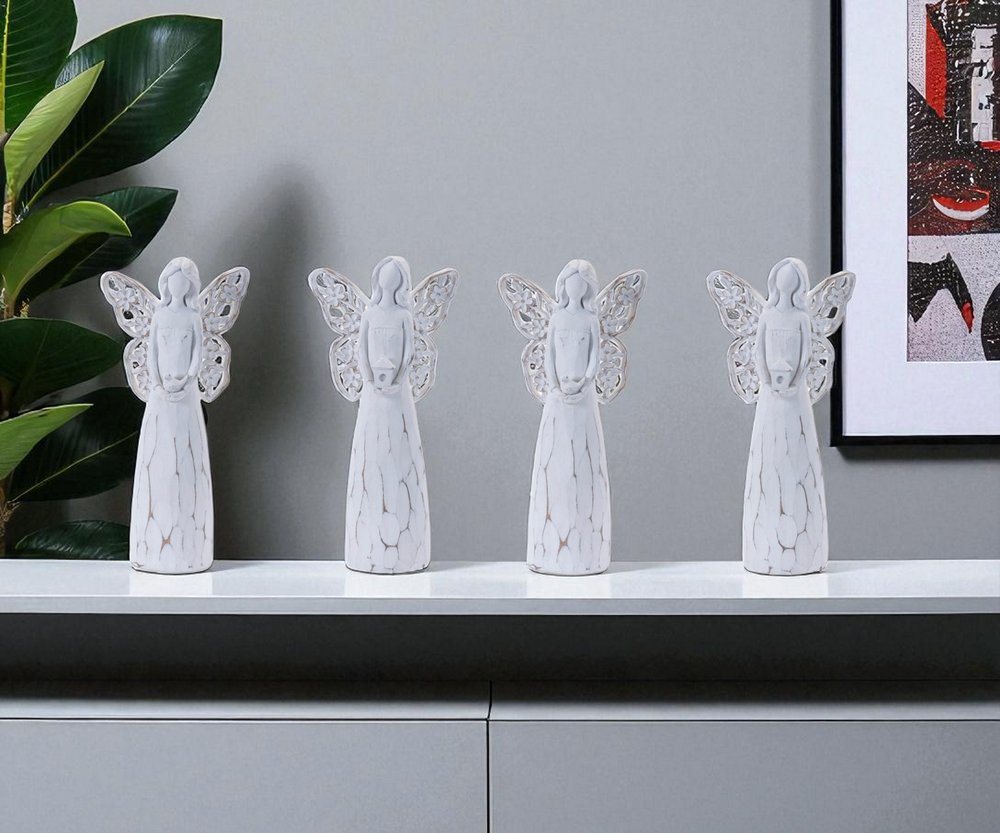 Set of Four White Polyresin Floral Wing Angel Figurines