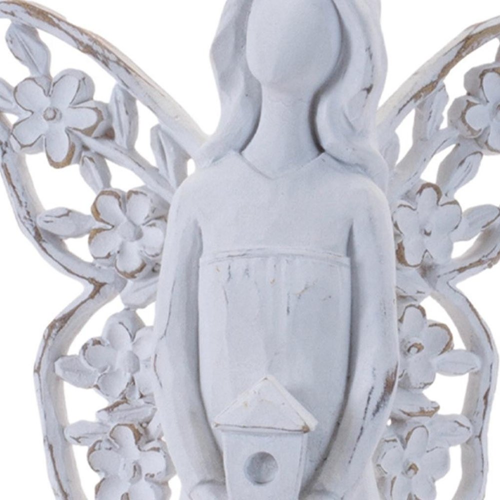 Set of Four White Polyresin Floral Wing Angel Figurines