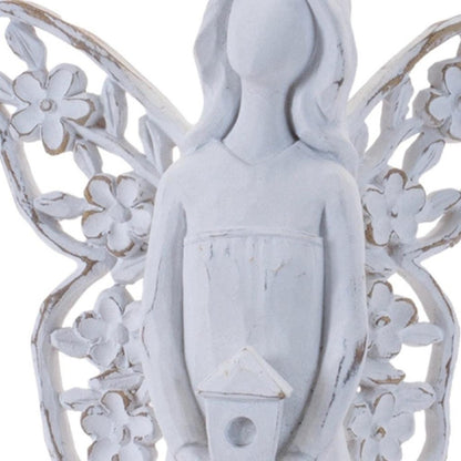 Set of Four White Polyresin Floral Wing Angel Figurines