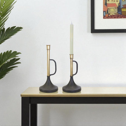 Set of Two Black And Gold Distressed Metal Tabletop Taper Candlesticks