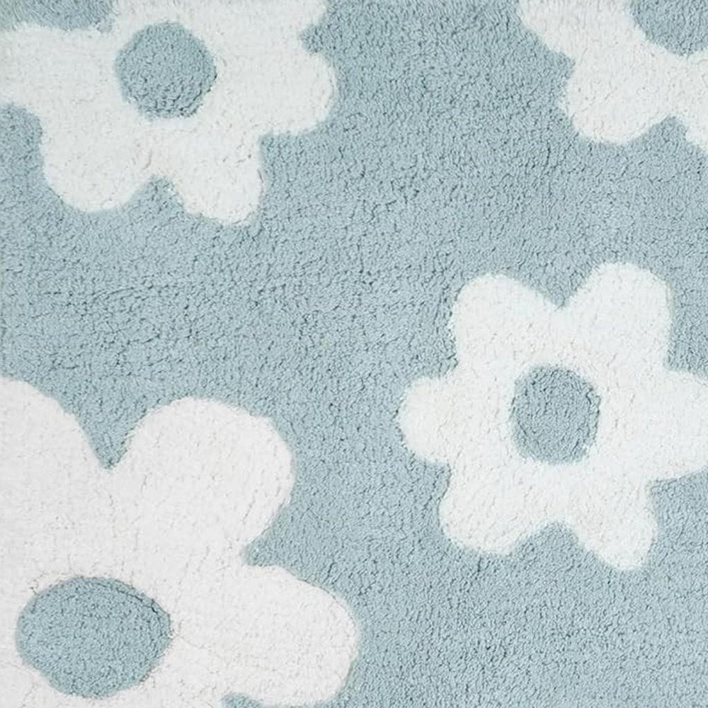 32" Blue And White Cotton Floral Bath Rug