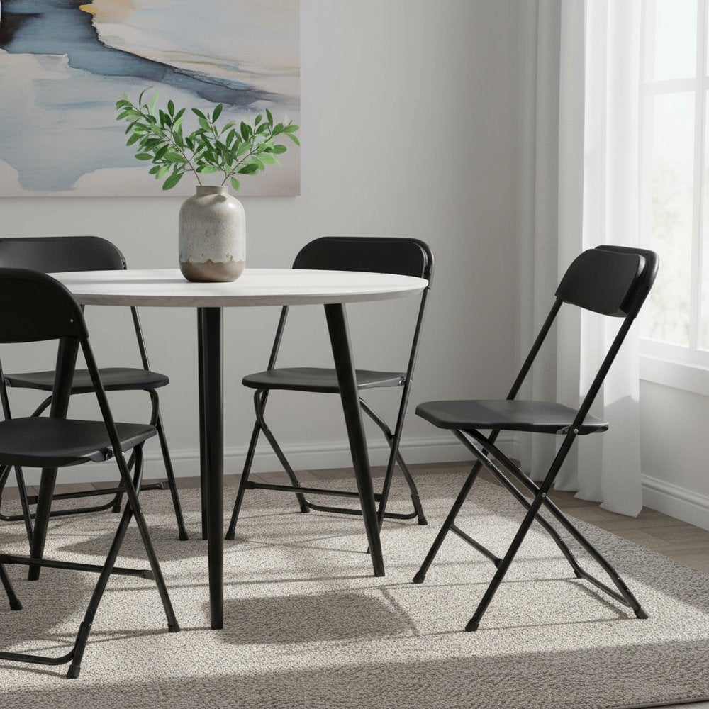 Set of Four Black Metal Outdoor Folding Stacking Dining Chairs
