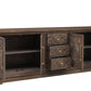 106" Brown Distressed Solid Wood Carved Floral Three Drawer Sideboard with Four Doors
