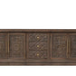 106" Brown Distressed Solid Wood Carved Floral Three Drawer Sideboard with Four Doors