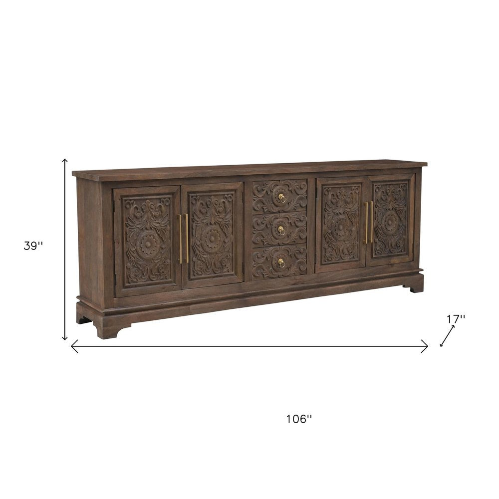 106" Brown Distressed Solid Wood Carved Floral Three Drawer Sideboard with Four Doors