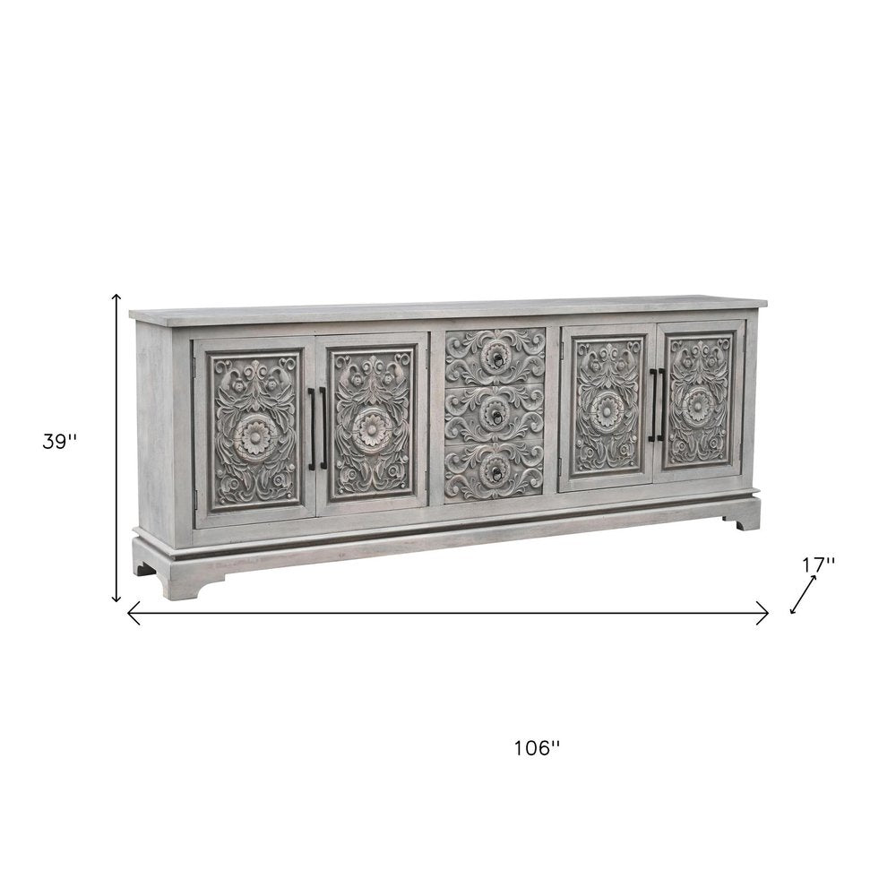 106" Gray Distressed Solid Wood Carved Floral Three Drawer Sideboard with Four Doors