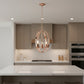 Rose Gold And Clear Sphere Three Light Iron Ceiling Light With Rose Gold Shades
