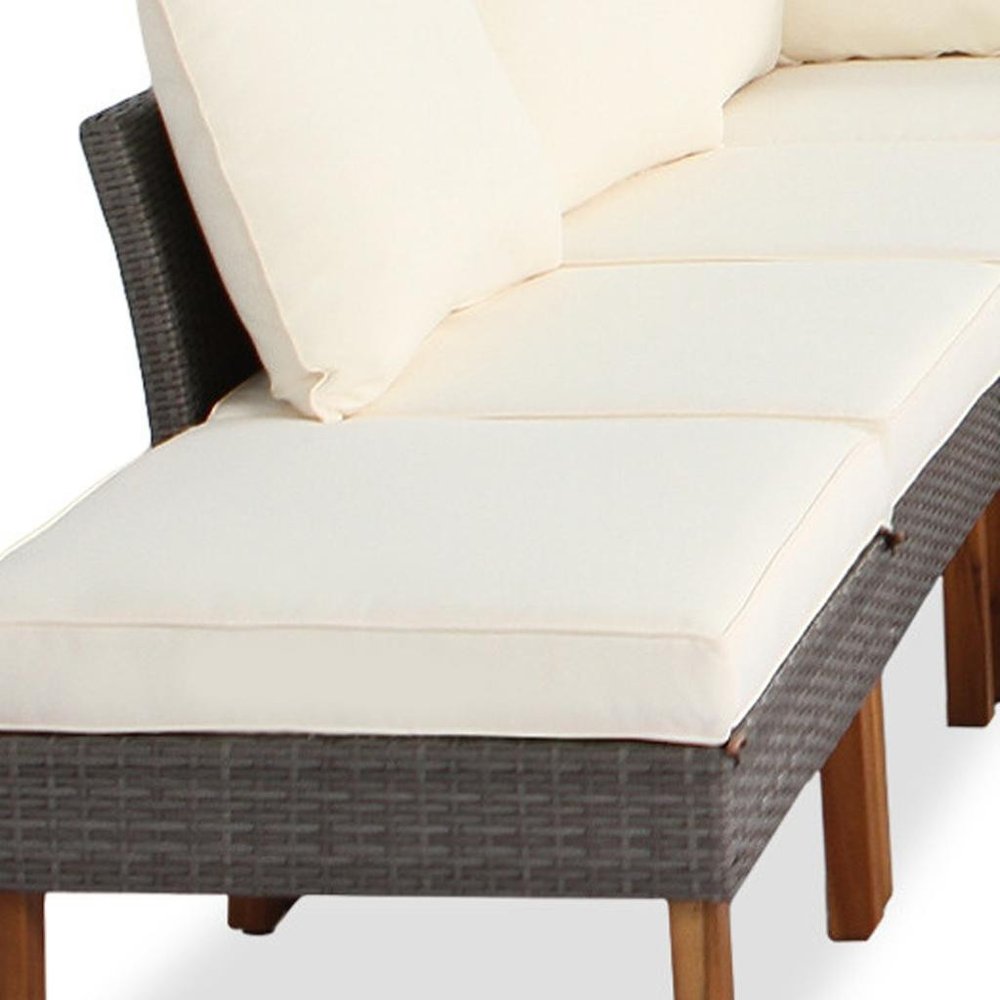 Nine Piece Gray and Beige Rattan Upholstered Cushions Sectional Seating Group With Table