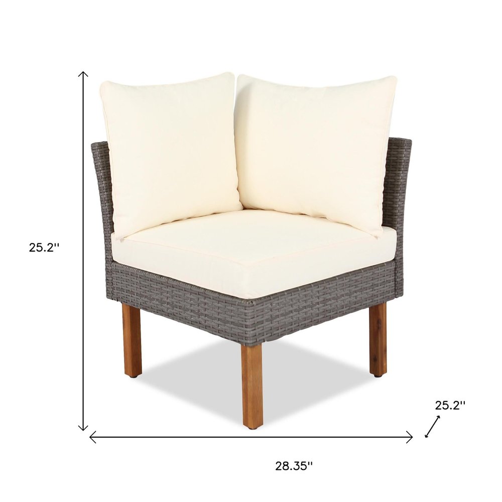 Nine Piece Gray and Beige Rattan Upholstered Cushions Sectional Seating Group With Table