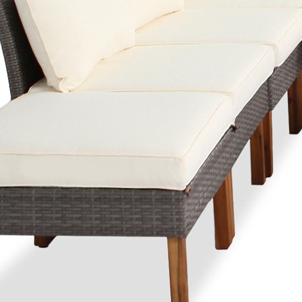 Nine Piece Gray and Beige Rattan Upholstered Cushions Sectional Seating Group With Table