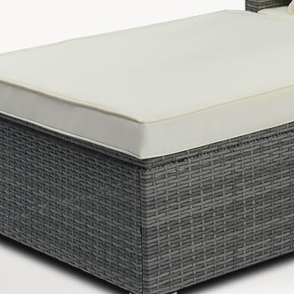 Eight Piece Gray and Beige Wicker Upholstered Cushions Sectional Seating Group With Table