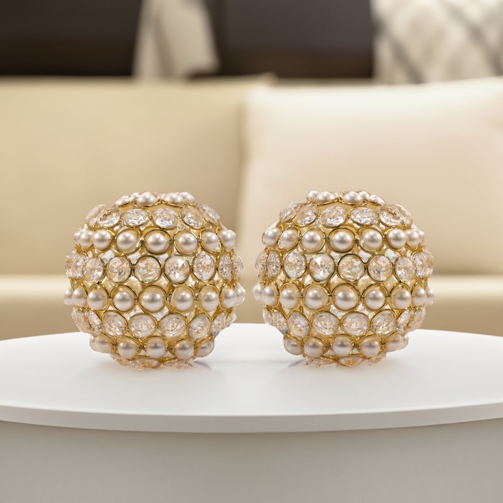 Set of Two Gold Ivory And Pearl Faux Crystal And Metal Decorative Orbs