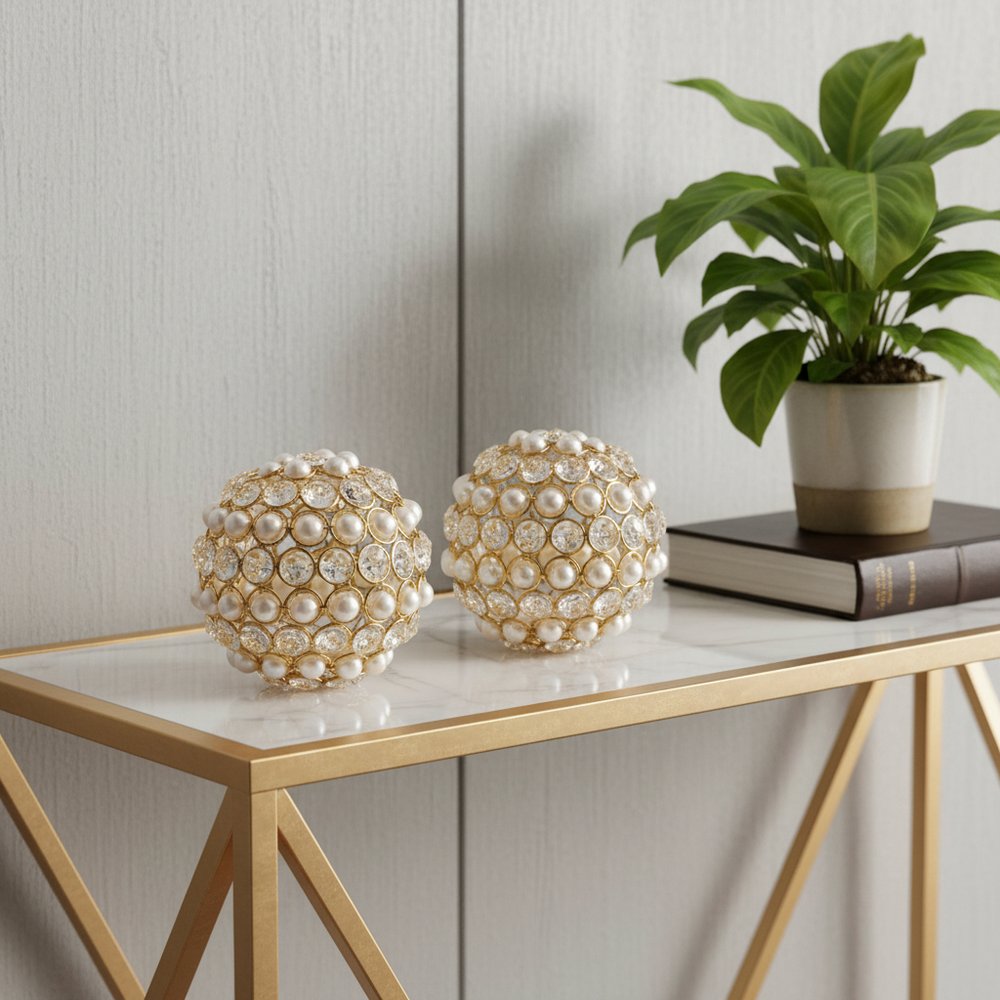 Set of Two Gold Ivory And Pearl Faux Crystal And Metal Decorative Orbs