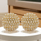 Set of Two Gold Ivory And Pearl Faux Crystal And Metal Decorative Orbs