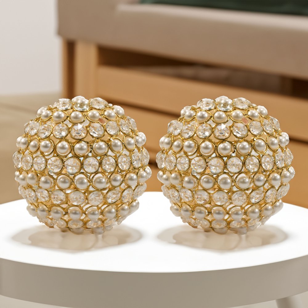 Set of Two Gold Ivory And Pearl Faux Crystal And Metal Decorative Orbs