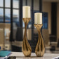 Set of Two Antiqued Gold Aluminum Wavy Faceted Tabletop Pillar Candle Holders
