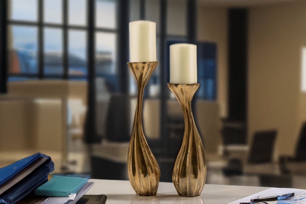 Set of Two Antiqued Gold Aluminum Wavy Faceted Tabletop Pillar Candle Holders