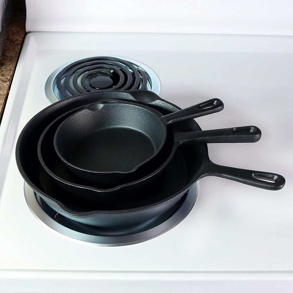 Set of Three Black Cast Iron Frying Pans