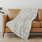 50" X 70" Beige And Charcoal Geometric Polyester Woven Plush Throw Blanket