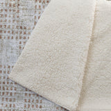 50" X 70" Cinnamon And Beige Geometric Polyester Woven Plush Throw Blanket