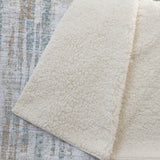 50" X 70" Ivory And Blue Abstract Polyester Woven Plush Throw Blanket