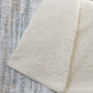 50" X 70" Ivory And Blue Abstract Polyester Woven Plush Throw Blanket
