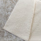 50" X 70" Beige And Ivory Damask Polyester Woven Plush Throw Blanket