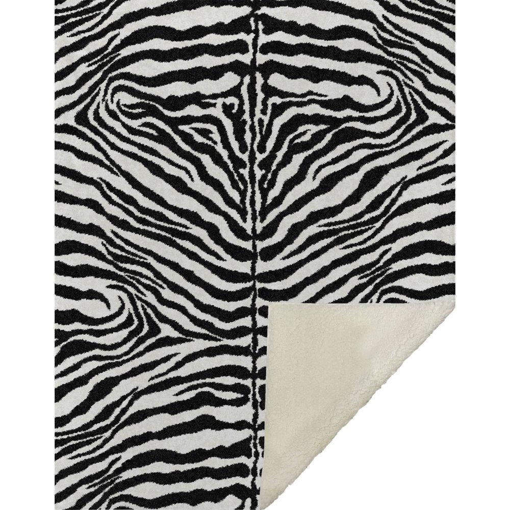 50" X 70" Black And Ivory Animal Print Polyester Woven Plush Throw Blanket