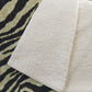 50" X 70" Black And Beige Animal Print Polyester Woven Plush Throw Blanket