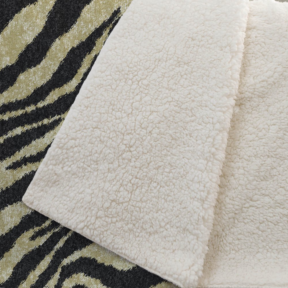 50" X 70" Black And Beige Animal Print Polyester Woven Plush Throw Blanket