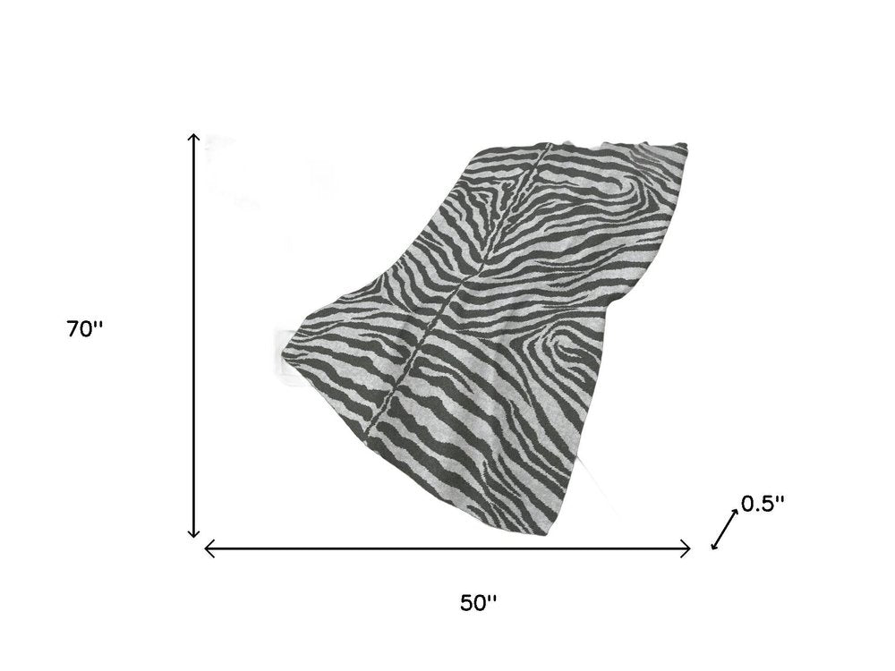 50" X 70" Gray And Ivory Animal Print Polyester Woven Plush Throw Blanket