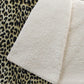 50" X 70" Black And Beige Animal Print Polyester Woven Plush Throw Blanket