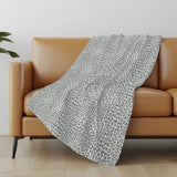 50" X 70" Gray And Ivory Animal Print Polyester Woven Plush Throw Blanket