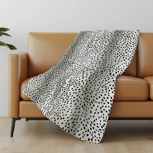 50" X 70" Pearl And Black Animal Print Polyester Woven Plush Throw Blanket