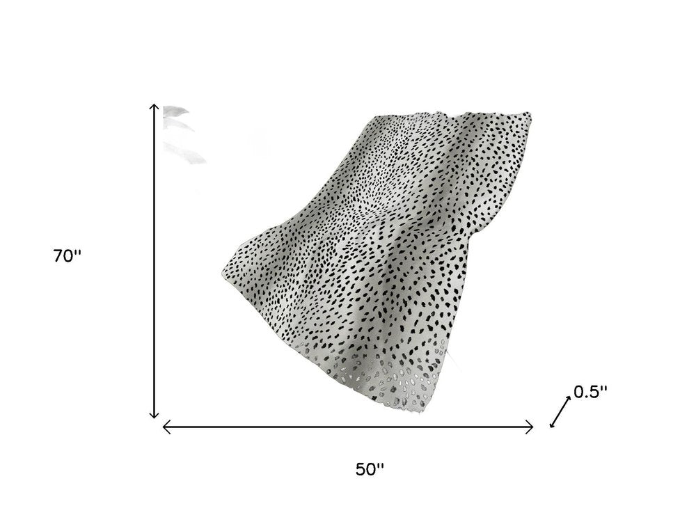 50" X 70" Pearl And Black Animal Print Polyester Woven Plush Throw Blanket