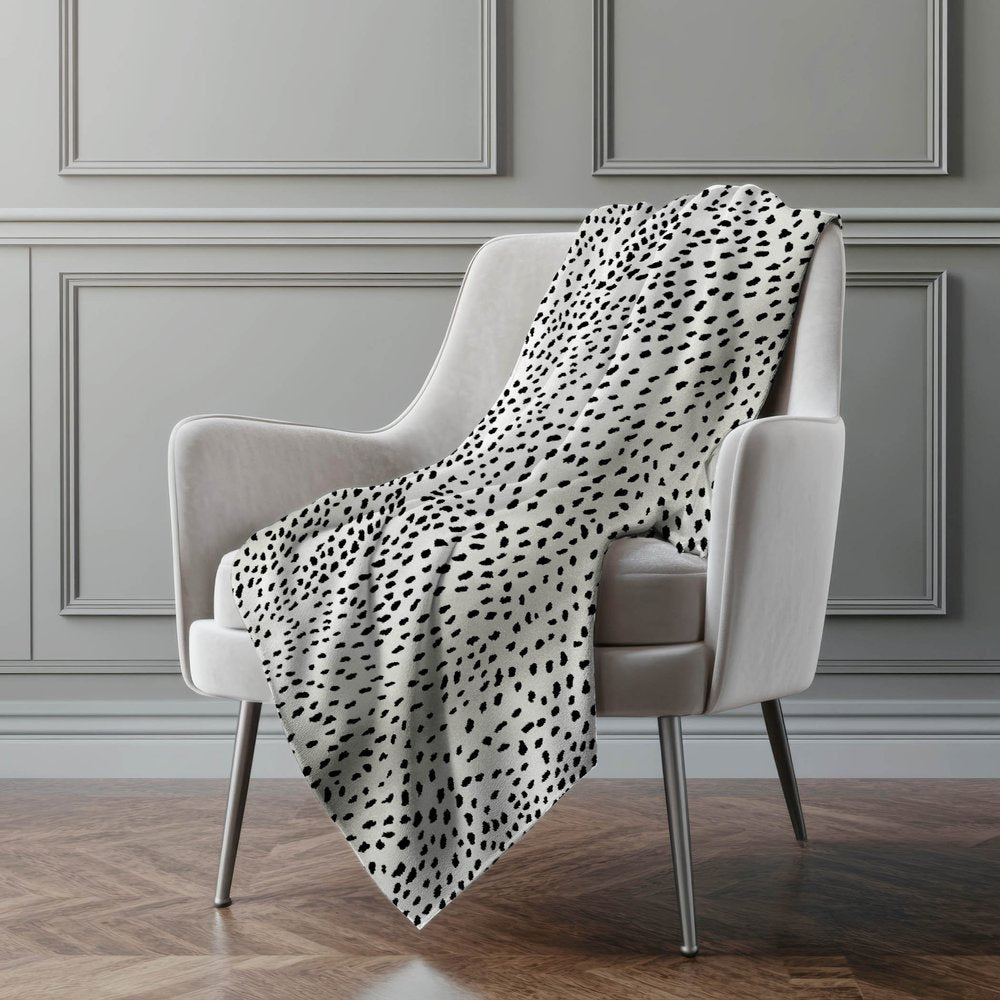 50" X 70" Pearl And Black Animal Print Polyester Woven Plush Throw Blanket