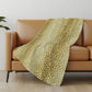 50" X 70" Ivory And Gold Animal Print Polyester Woven Plush Throw Blanket
