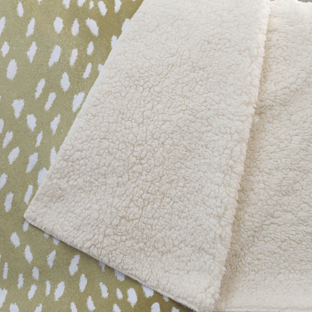 50" X 70" Ivory And Gold Animal Print Polyester Woven Plush Throw Blanket